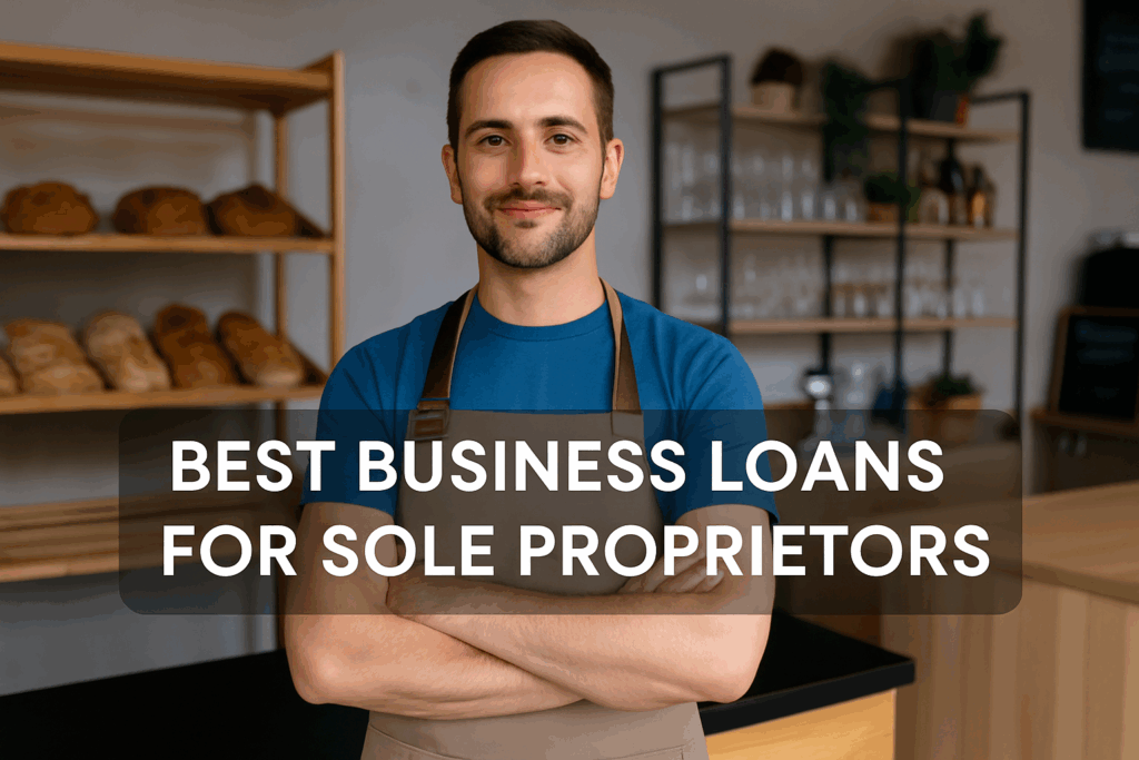 Best Business Loans for Sole Proprietors - Alt text: "Confident sole proprietor wearing a blue shirt and beige apron stands with arms crossed inside a small, well-organized shop with bread on shelves and glassware in the background. A dark transparent overlay displays the white bold text: 'BEST BUSINESS LOANS FOR SOLE PROPRIETORS' across the center."